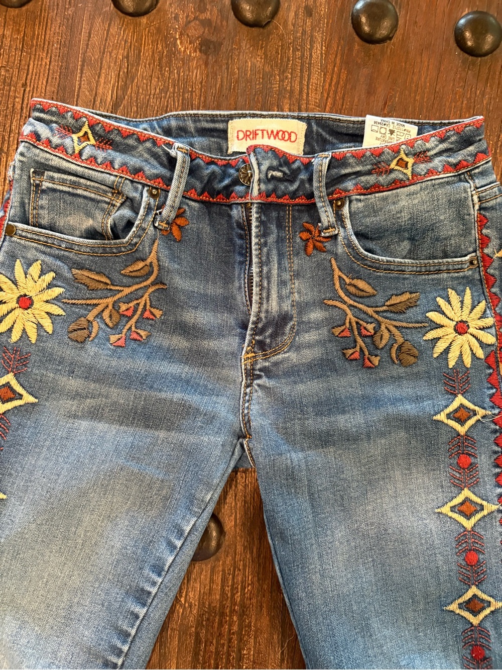 DRIFTWOOD Blue Flare Jeans with Red, Yellow & Cream Embroidery - Picture 2 of 8